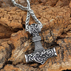 Viking Mjolnir Hammer Pendant Necklace with intricate knotwork on a wheat chain view 5