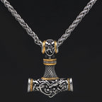 Viking Mjolnir Hammer Pendant Necklace with intricate knotwork on a wheat chain