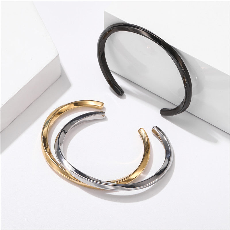Titanium Steel C-Shaped Cuff Bracelet in gold, silver, and black finishes