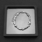 5mm Irregular Bead Stainless Steel Chain, silver finish, black background view 6
