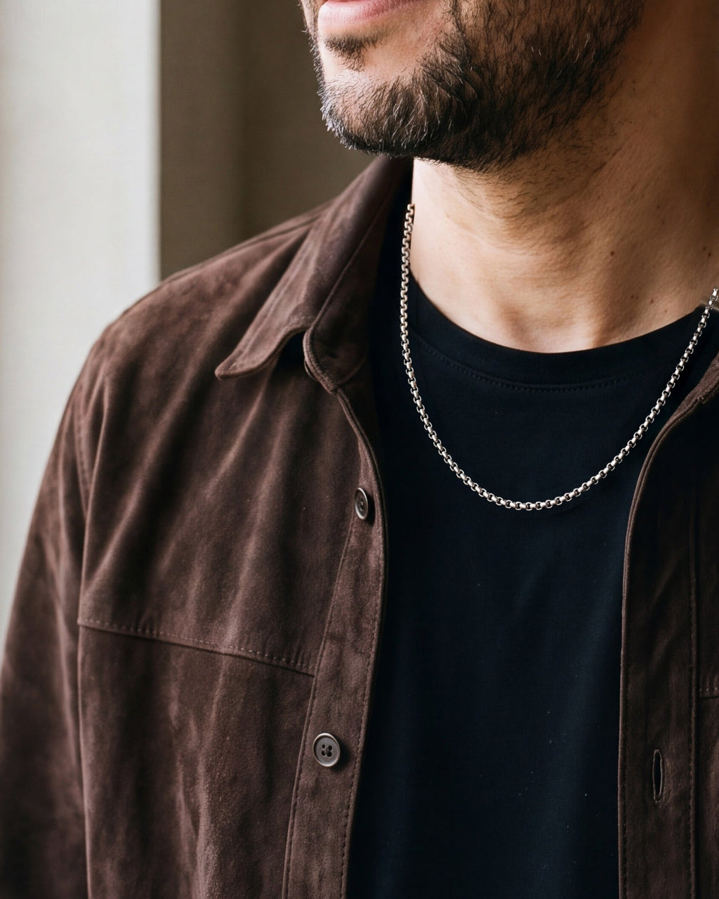Close-up of the silver-tone Atlas Rolo Chain worn, true size