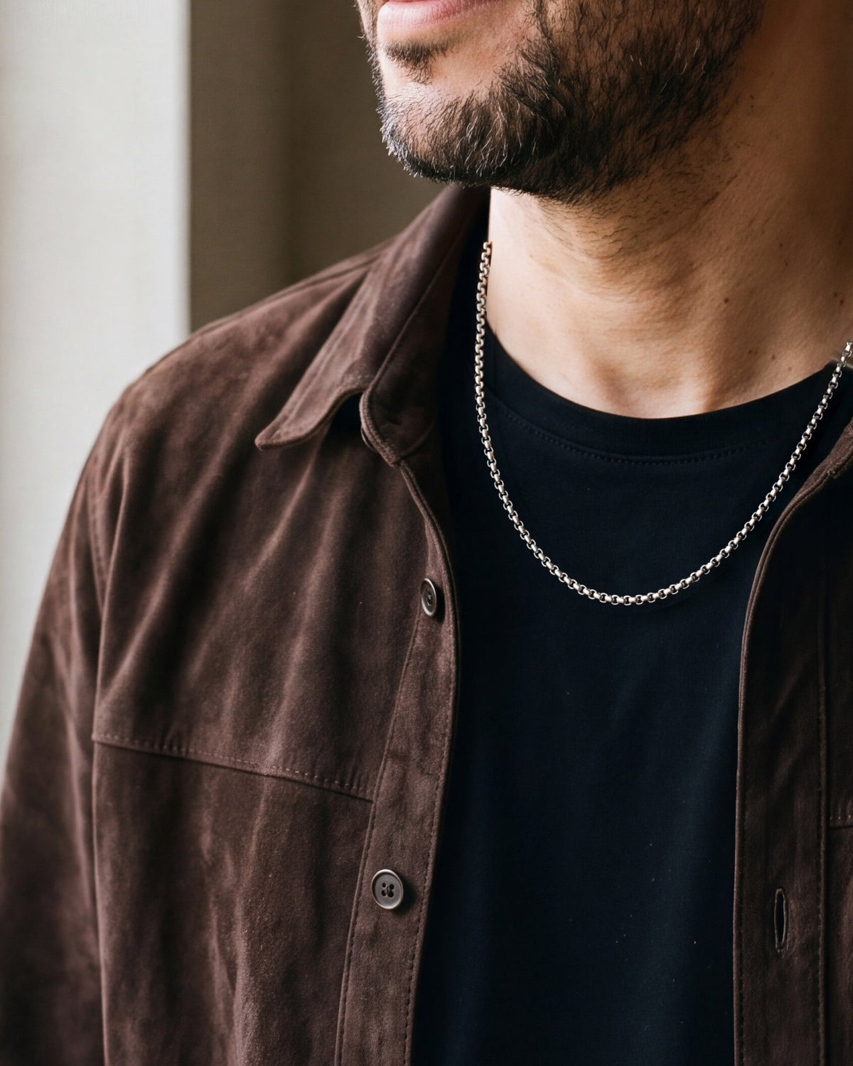 Close-up of the silver-tone Atlas Rolo Chain worn, true size