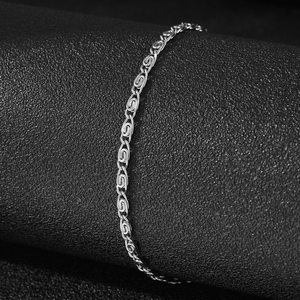Stainless Steel Scroll Link Bracelet on black background view 3