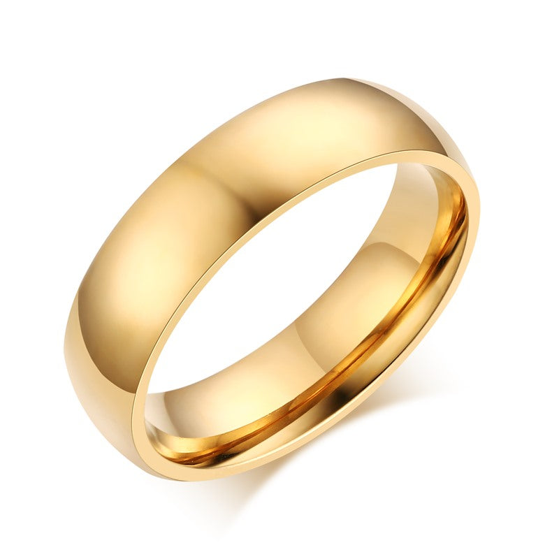 Gold-Tone Domed Stainless Steel Band Ring on black surface view 6
