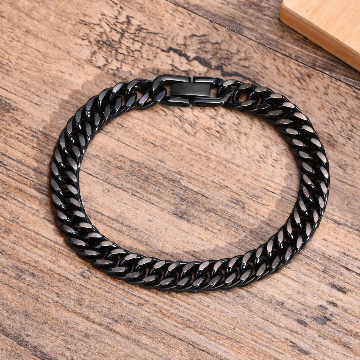 8mm Stainless Steel Curb Link Bracelet closed on wood background view 6