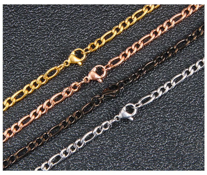 The Flat Gold-Tone Figaro Chain in Stainless Steel, view 2