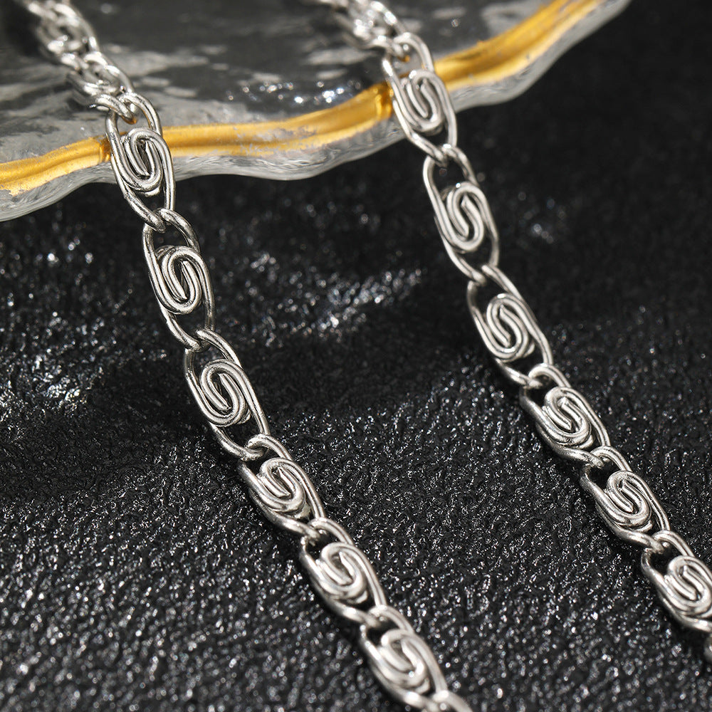 Stainless Steel Scroll Link Bracelet on black background view 4