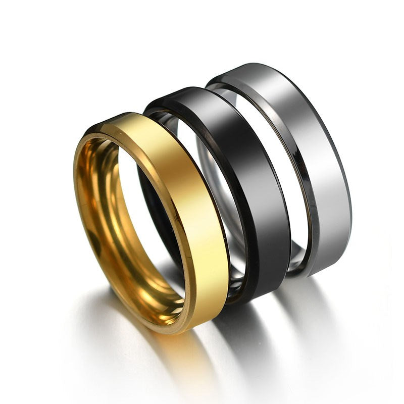 6mm Stainless Steel Beveled Band Ring in gold, black, and silver