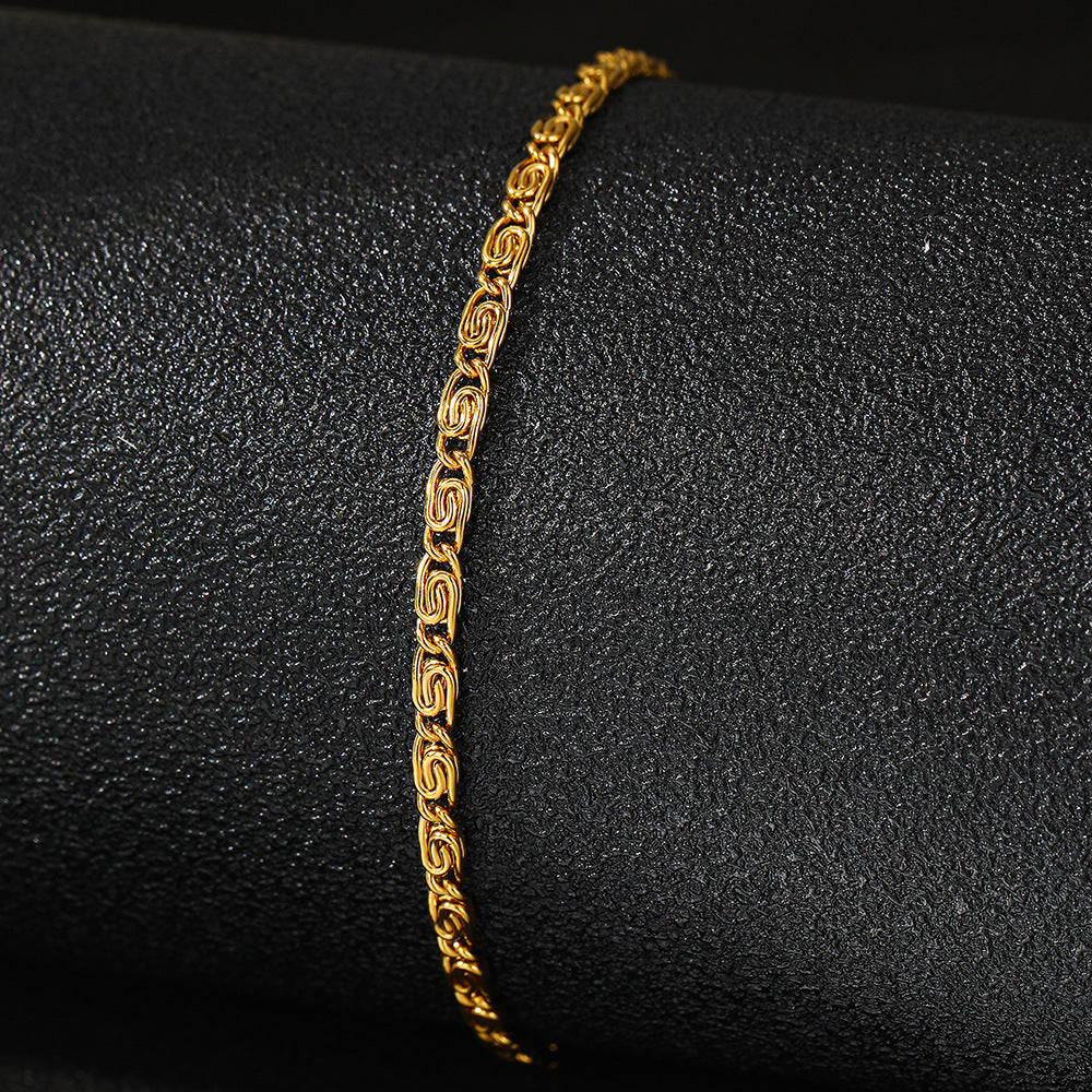 Stainless Steel Scroll Link Bracelet on black background
