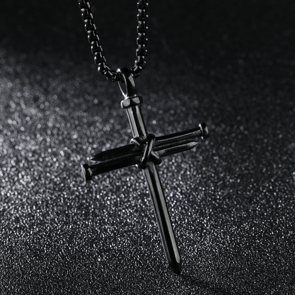 Nail Cross Pendant Necklace in black, gold-tone, and silver-tone view 3