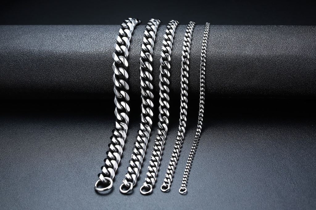 Titanium Steel Cuban Link Bracelet in silver-tone and black finishes