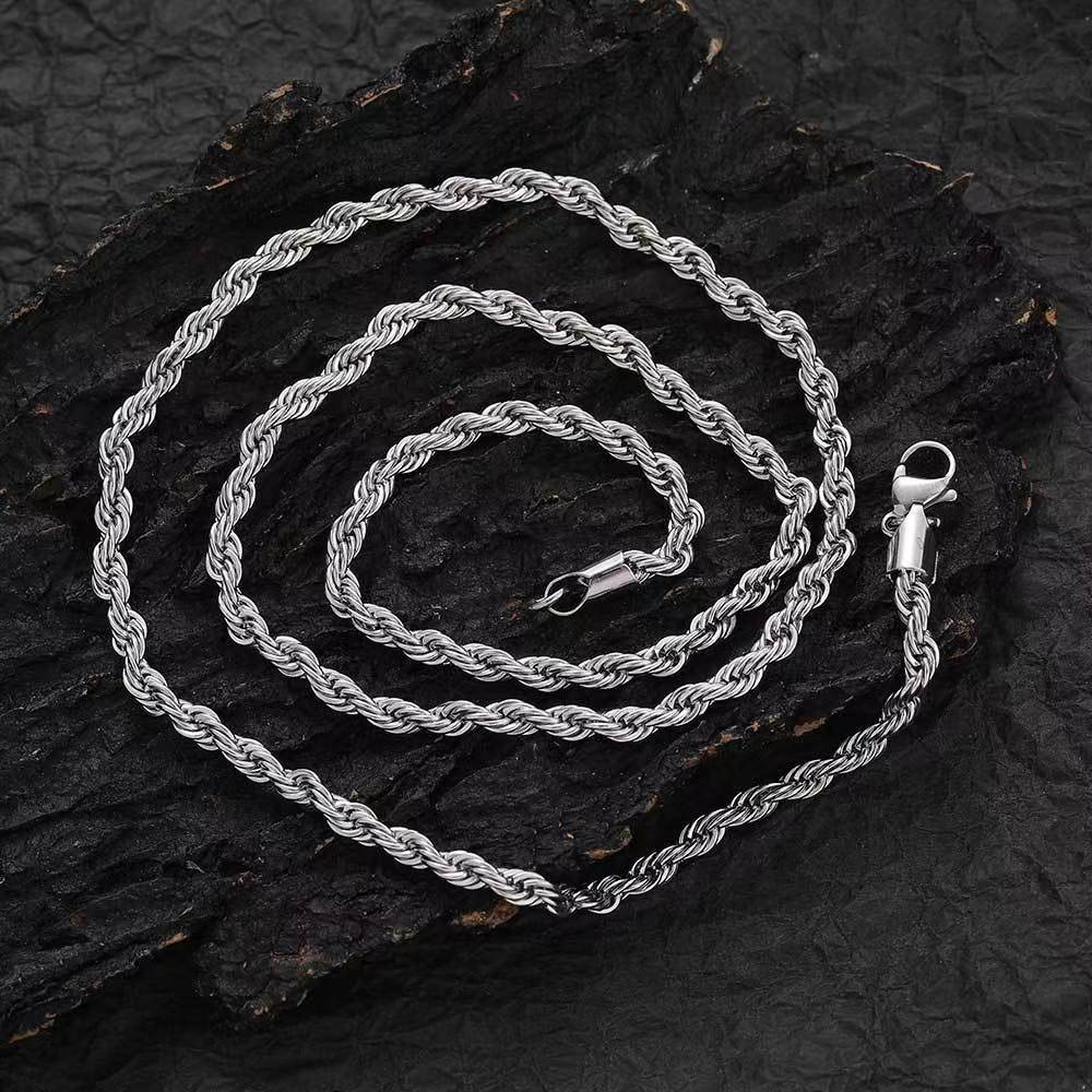 2-5mm Stainless Steel Rope Chain on dark wood texture