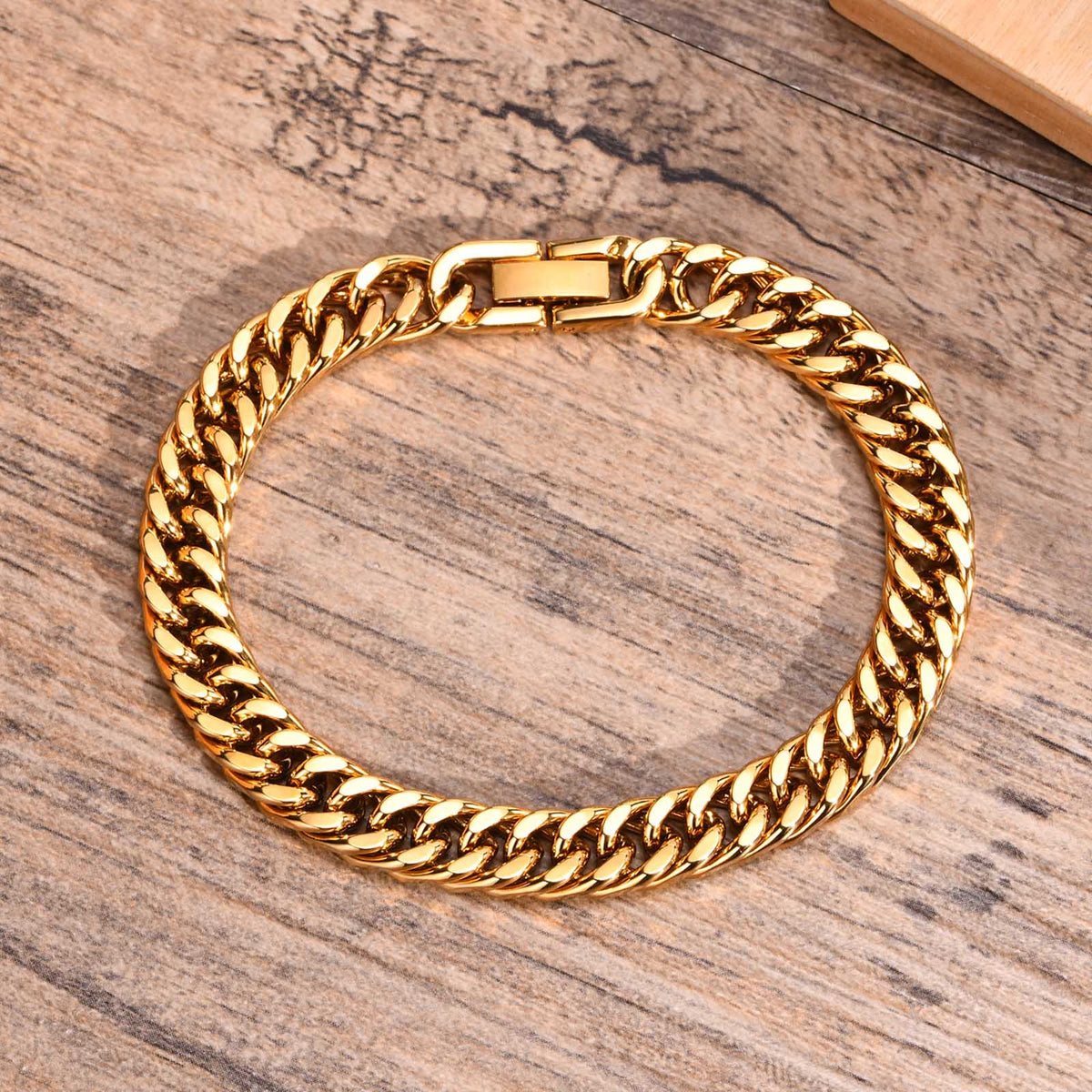 8mm Stainless Steel Curb Link Bracelet closed on wood background view 7