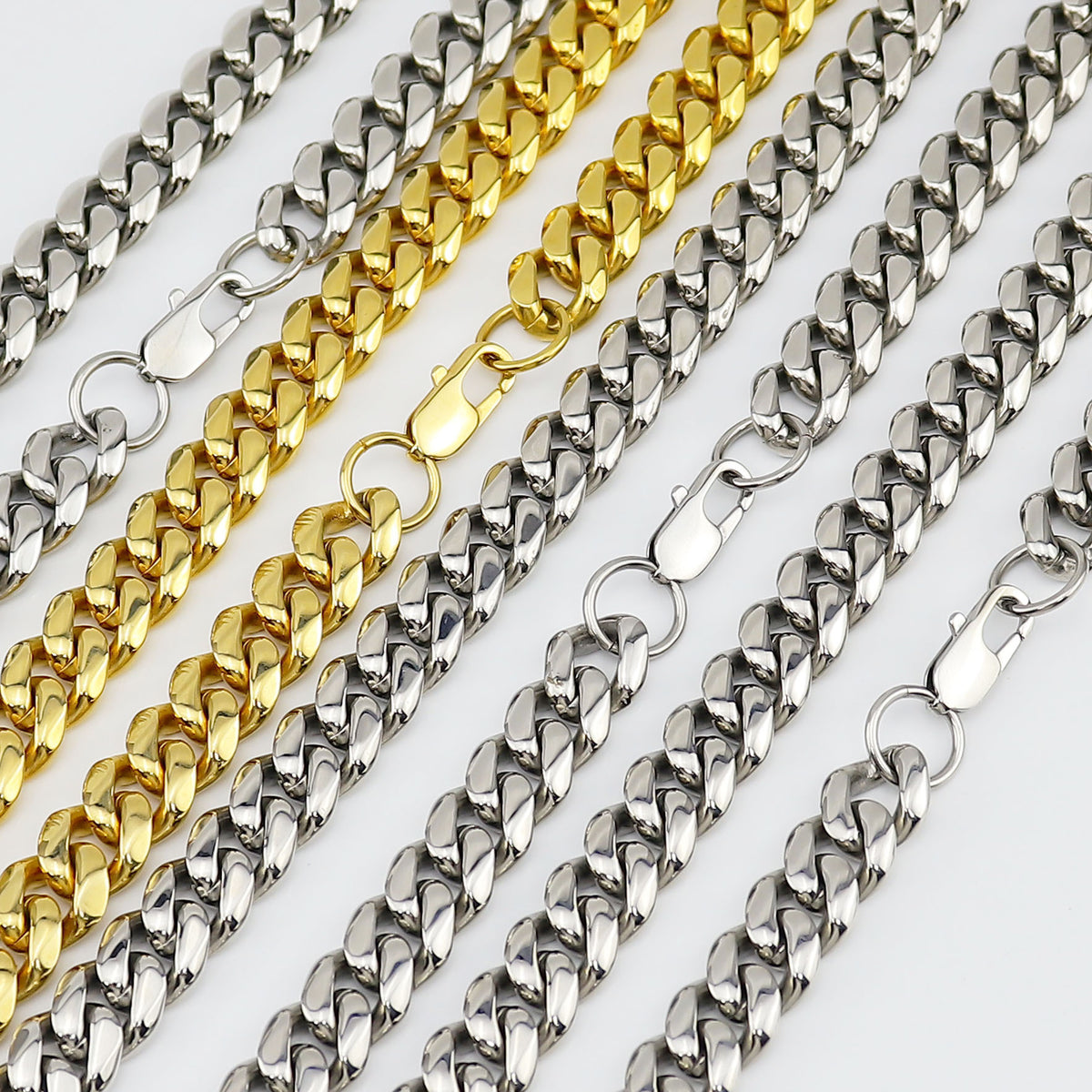 Cuban Link Chain Necklace, gold-tone finish, coiled view 4