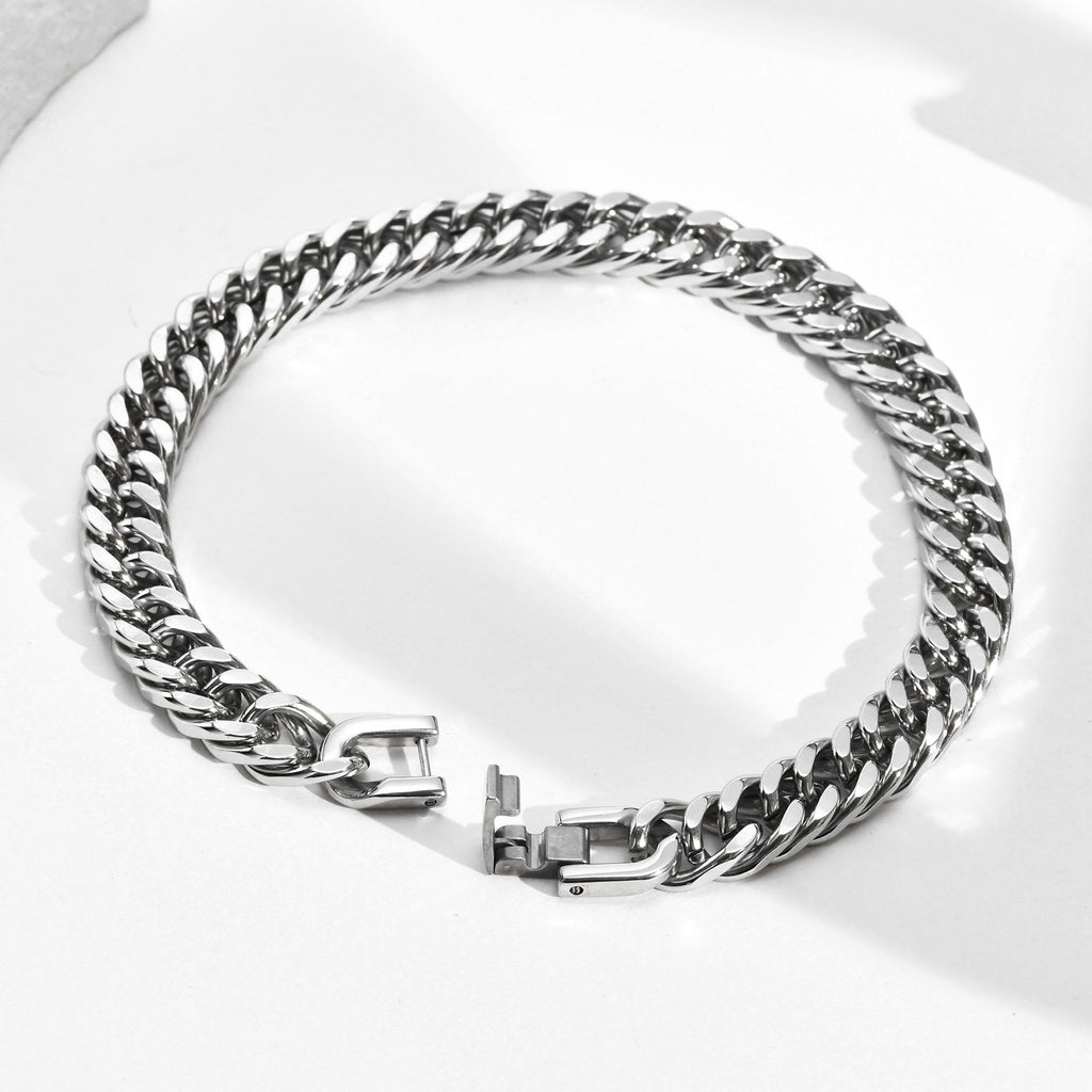 8mm Stainless Steel Curb Link Bracelet closed on wood background view 2