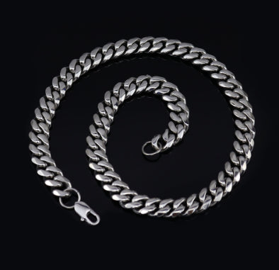 Cuban Link Chain Necklace, gold-tone finish, coiled view 3