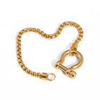 Box Link Shackle Bracelet gold-tone on white background