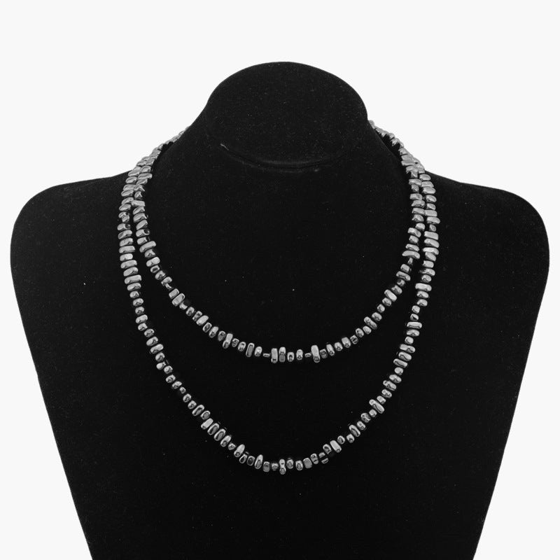 5mm Irregular Bead Stainless Steel Chain, silver finish, black background view 5