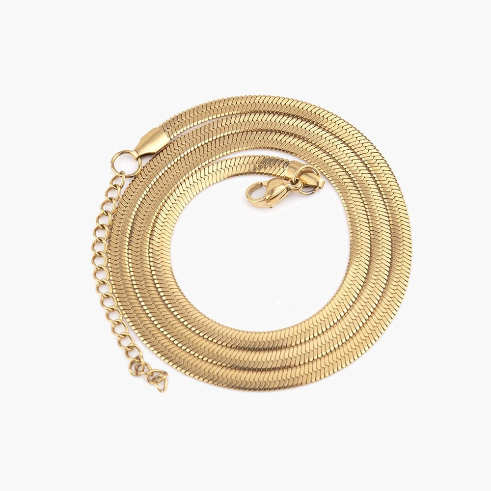 5mm Snake Chain Necklace in gold-tone stainless steel, coiled on a white background