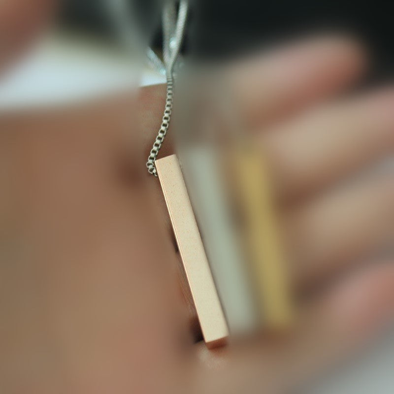 Titanium Steel Rectangular Bar Pendant on hand view 4
