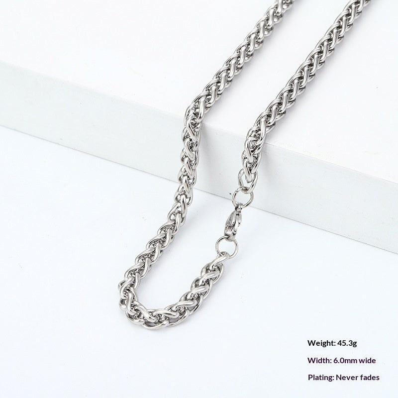 Titanium Steel Wheat Chain Necklace gold-tone on white background view 4