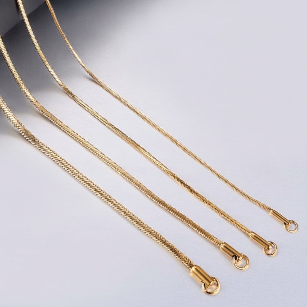 Gold-Tone Stainless Steel Snake Chain on dark background view 5