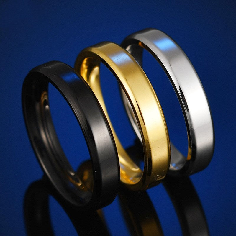 6mm Stainless Steel Beveled Band Ring in gold, black, and silver view 2