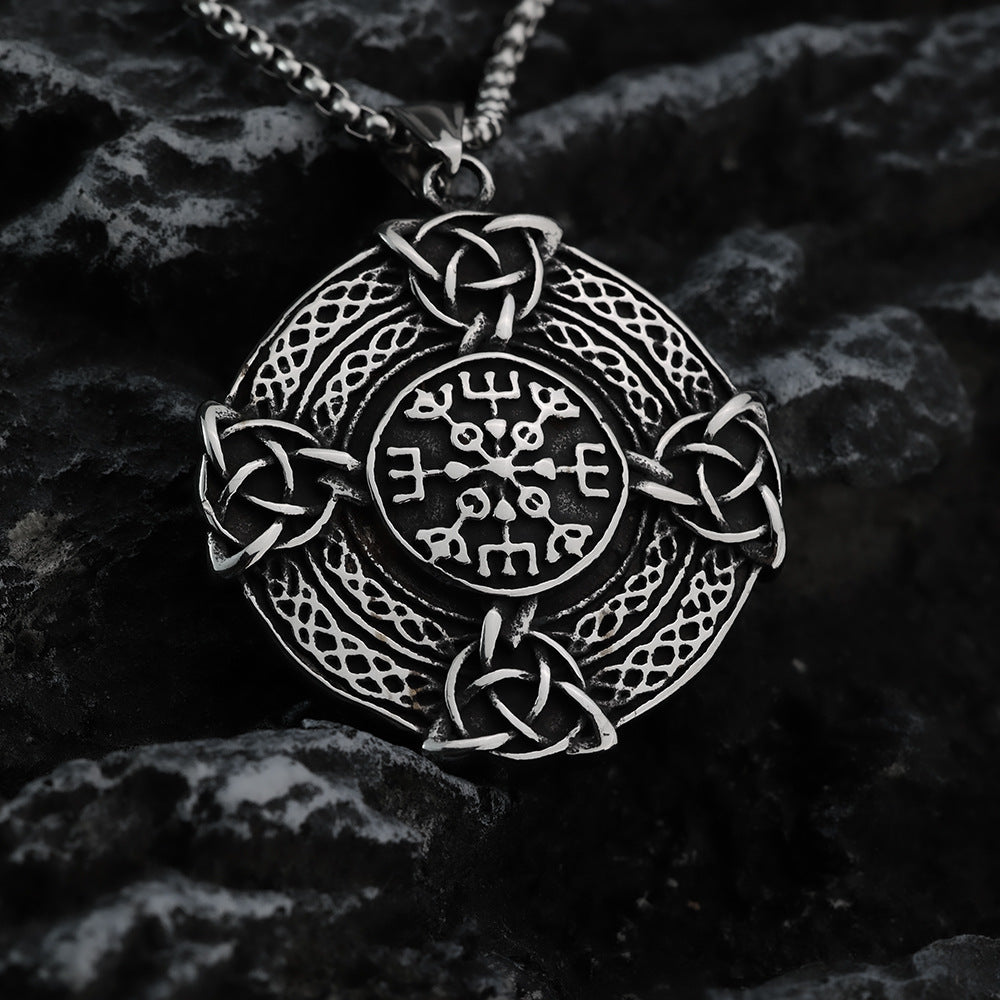 Stainless Steel Viking Compass Pendant Necklace with chain on dark rock