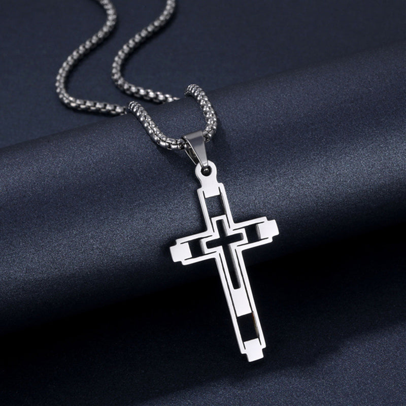 Hollow Geometric Cross Pendant Necklace, silver-tone on dark background