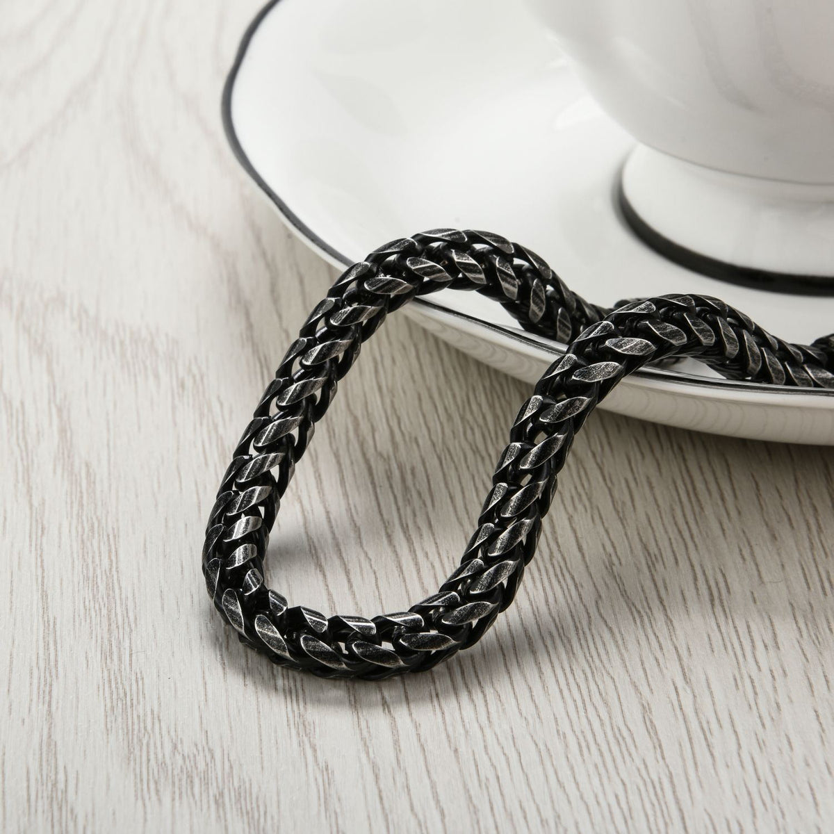 Vintage Finish Wheat Chain Bracelet on dark surface, closed clasp view 2