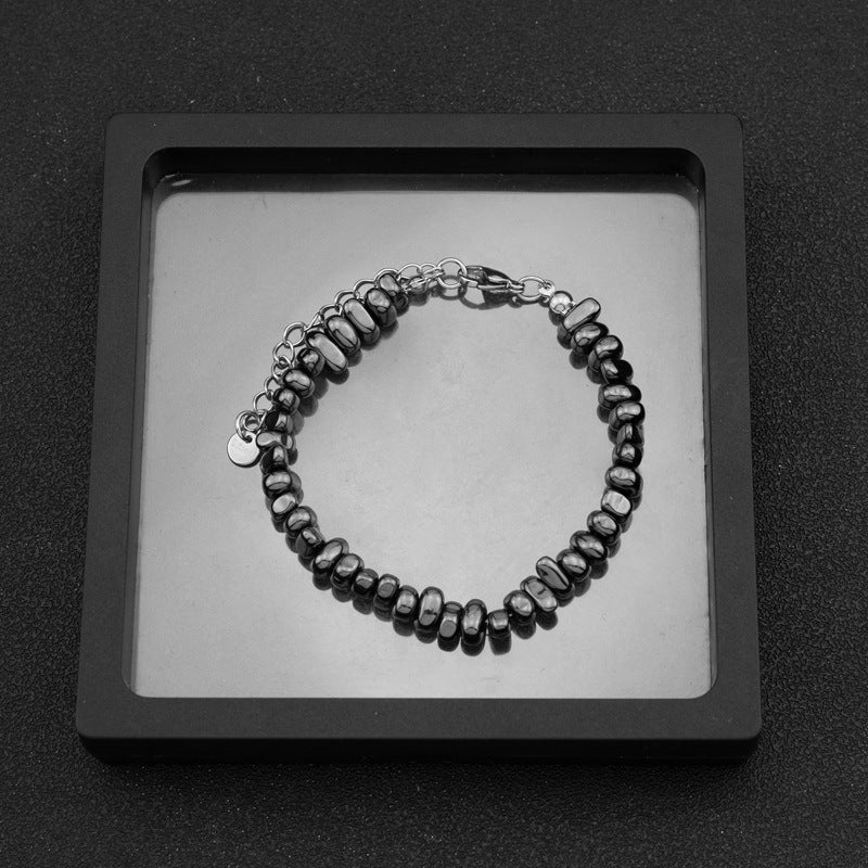 5mm Irregular Bead Stainless Steel Chain, silver finish, black background view 4