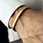 Minimalist Stainless Steel Cuff Bracelet gold-tone on wrist