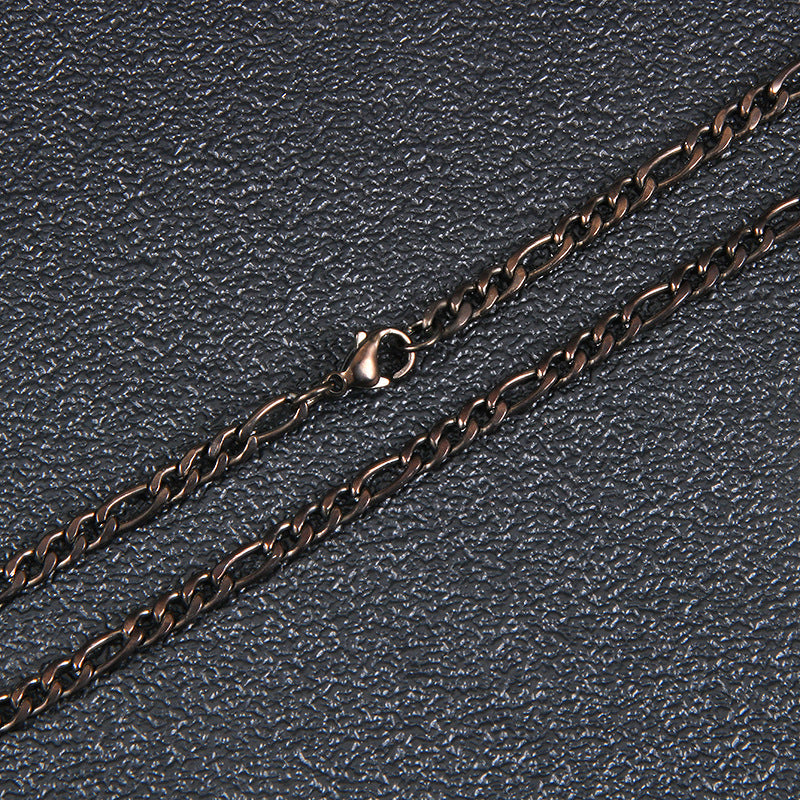 The Flat Gold-Tone Figaro Chain in Stainless Steel, view 6