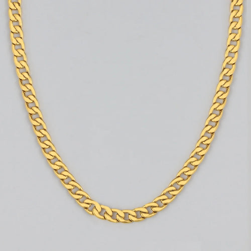 Polished gold Cuban link chain necklace for men on a light gray background