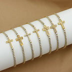 Gold Plated Cross Charm CZ Tennis Bracelet