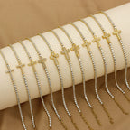 Gold Plated Cross Charm CZ Tennis Bracelet