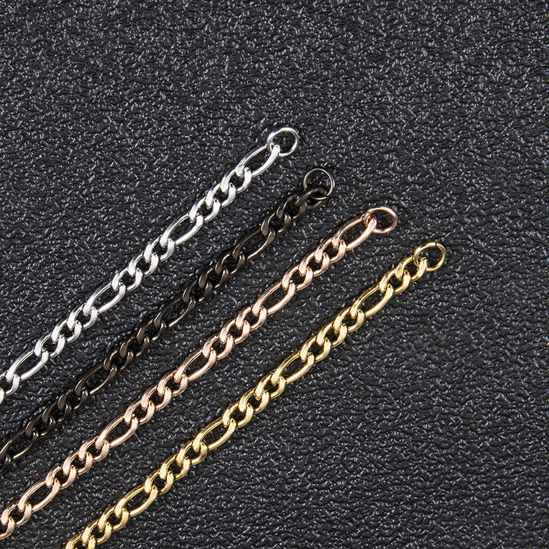 The Flat Gold-Tone Figaro Chain in Stainless Steel, view 5