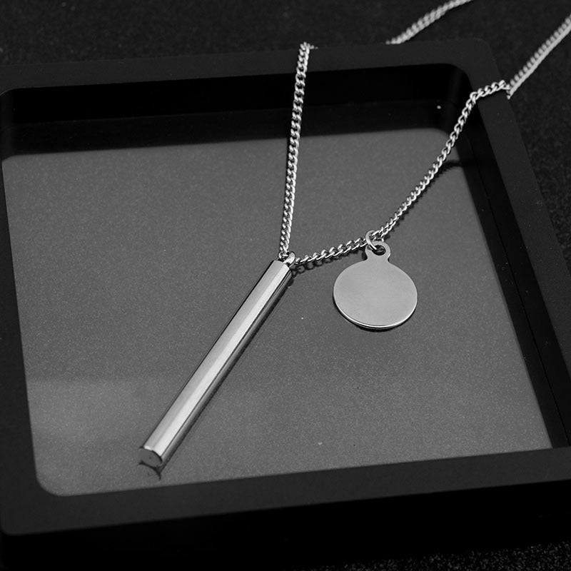 Stainless Steel Bar Disc Pendant Necklace on a black background view 3