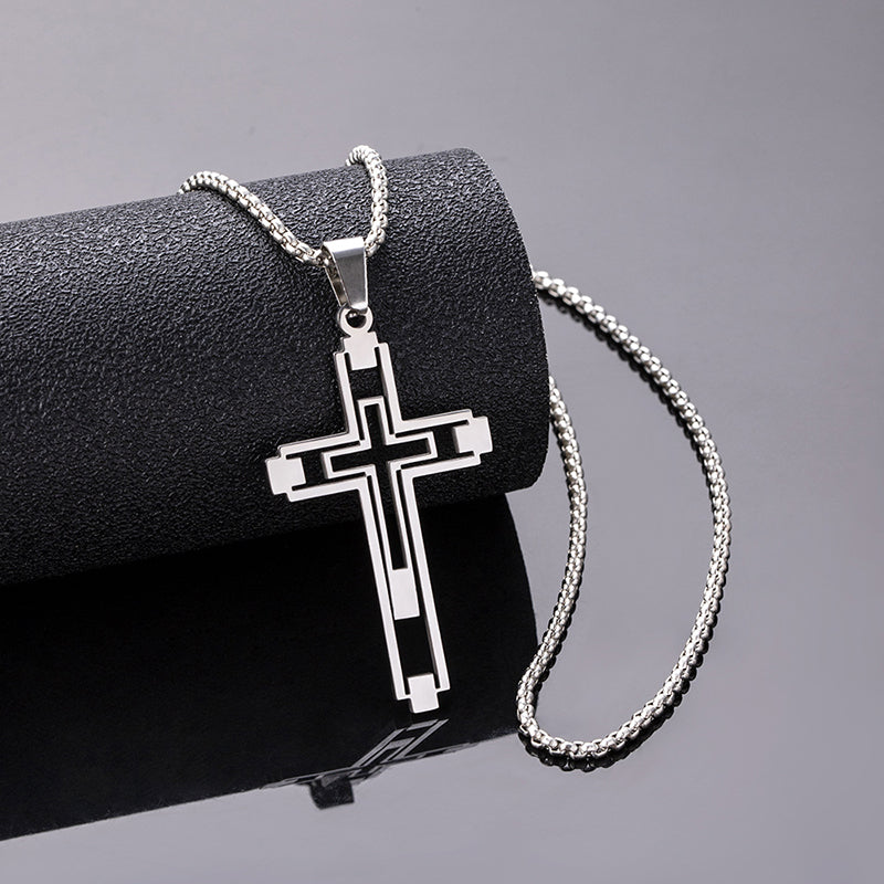 Hollow Geometric Cross Pendant Necklace, silver-tone on dark background view 3