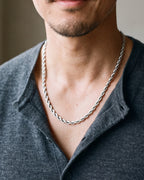 Close-up of the 6 mm silver Atlas rope chain worn at true size