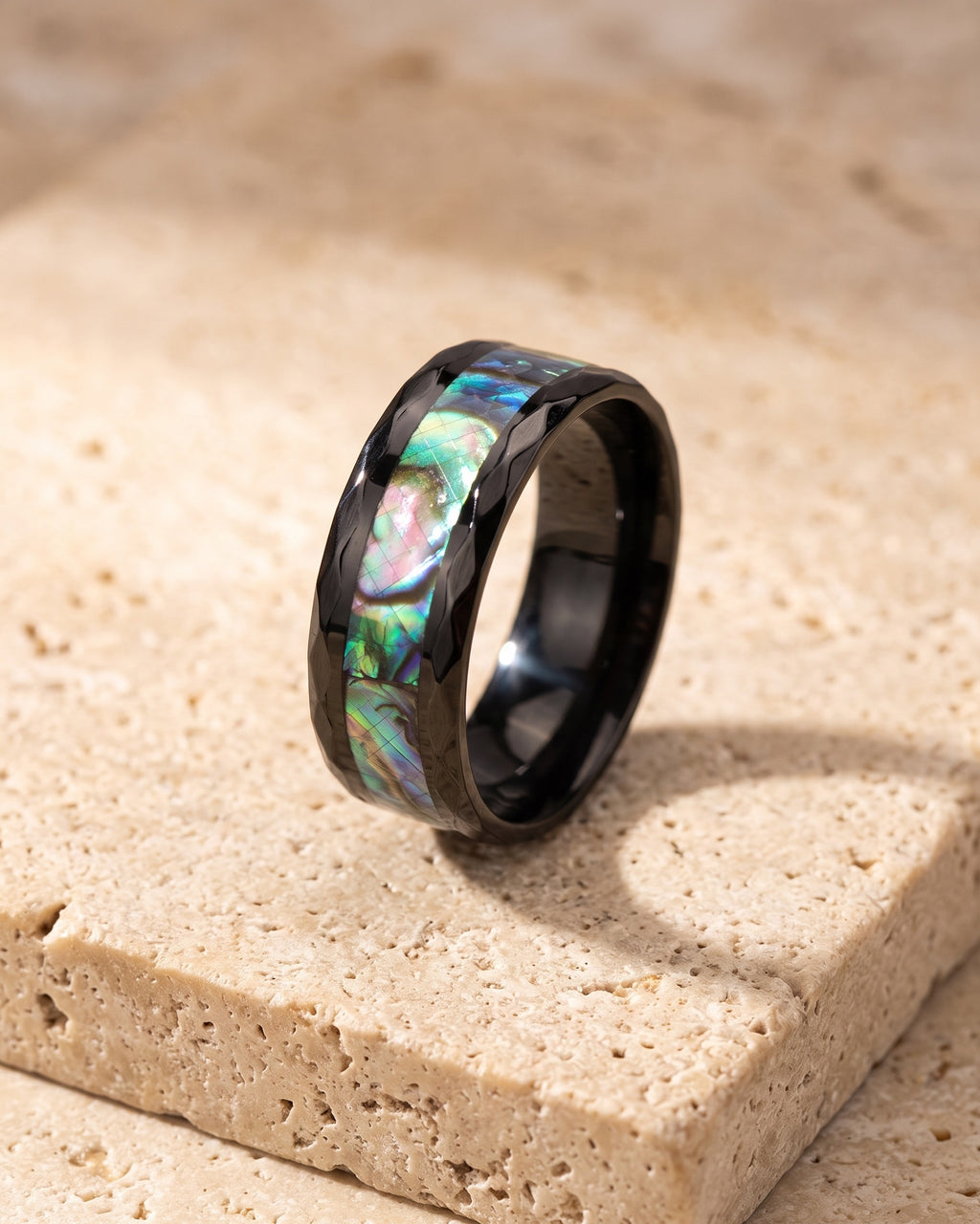 Atlas abalone inlay black band standing on warm stone
