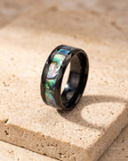 Atlas abalone inlay black band standing on warm stone