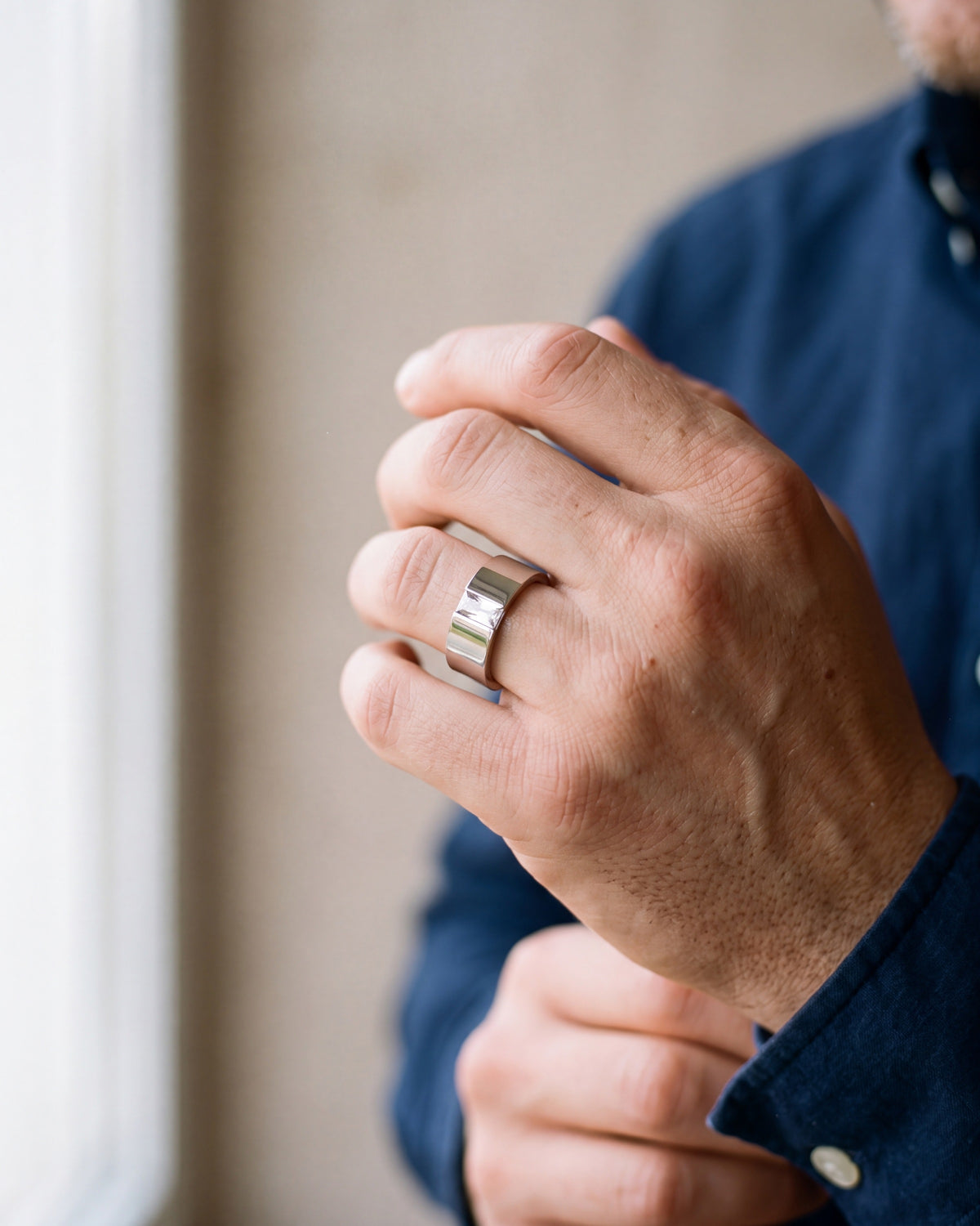 Close-up of the silver-tone Atlas Baguette Cubic Zirconia Ring worn at true size