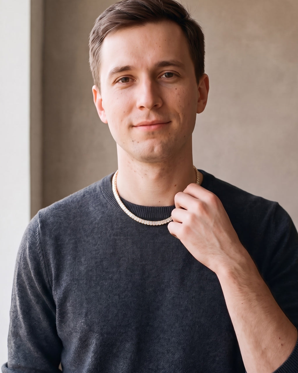 Man wearing the gold-tone Atlas Baguette Tennis Chain