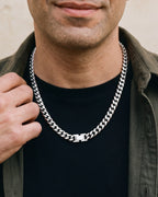 Close-up of the 6 mm silver Atlas Miami Cuban chain on a man's neck at true size