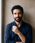 Man in a navy shirt wearing the silver-tone Atlas brushed double groove ring