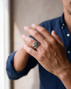Close-up of the silver-tone Atlas celtic knot ring worn at true size
