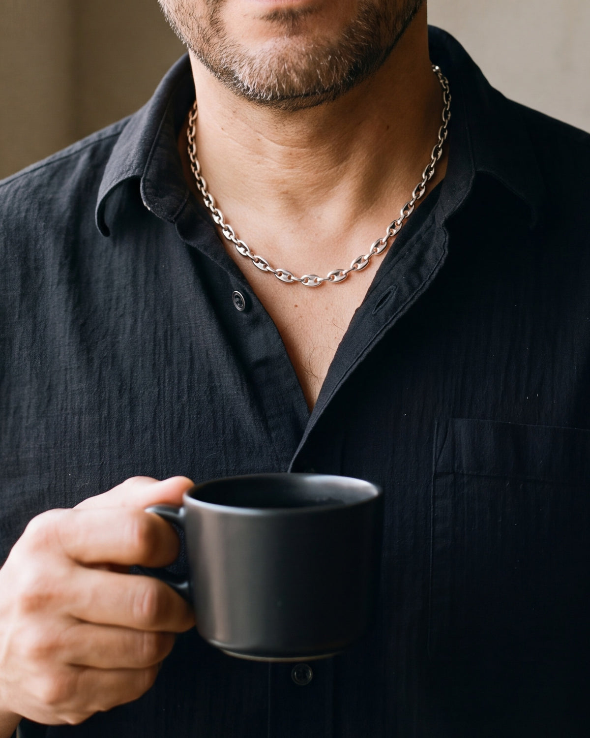 Close-up of the silver Atlas Coffee Bean Chain worn at true size