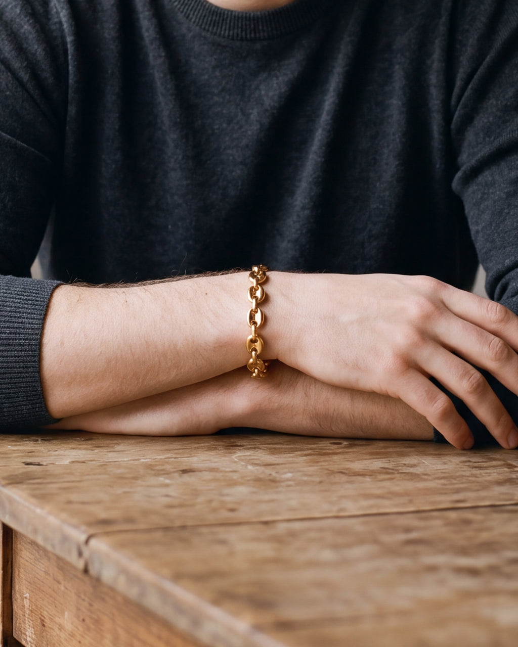 Close-up of the Atlas coffee bean links on a man's wrist