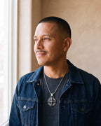 Man wearing the silver Atlas Compass Pendant Necklace in Steel